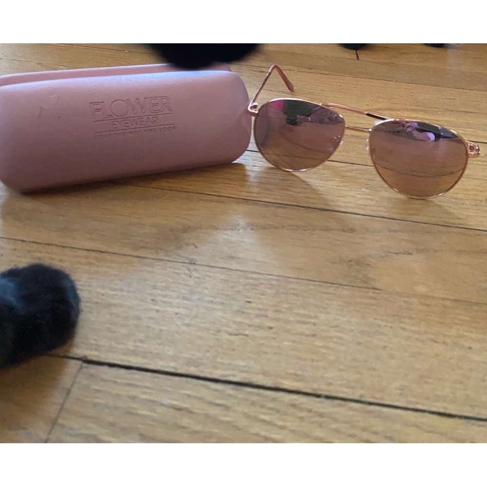 Drew Barrymore “Flower” brand Sunglasses with case thrown in.